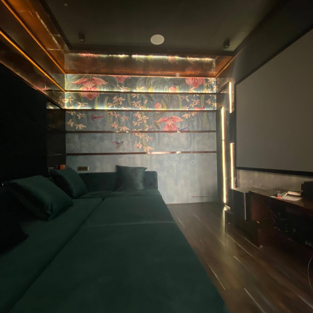 Green lounge-style private cinema